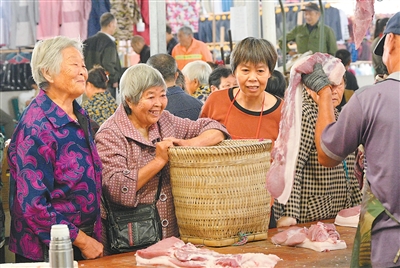 假日保供的温暖im钱包官网底色(新时代画卷)